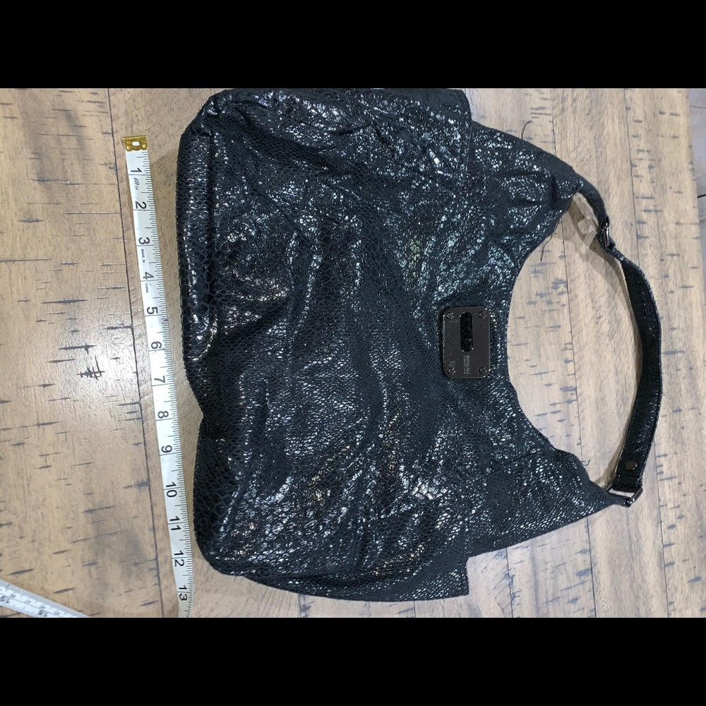 Black on black Kenneth Cole snakes skin boho bag